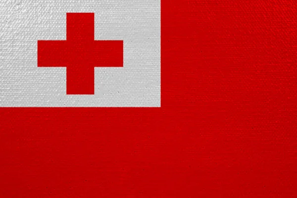 Tonga flag on canvas. Patriotic background. National flag of Tonga