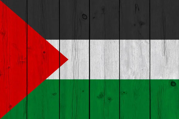 palestine flag painted on old wood plank