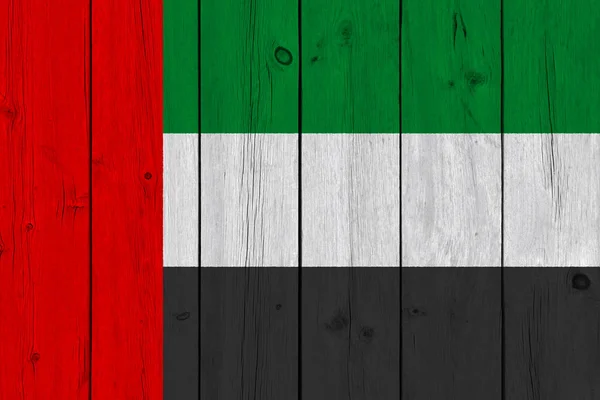 united arab flag painted on old wood plank