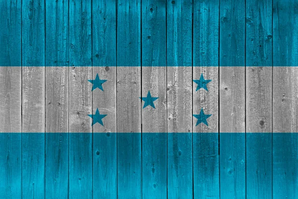 Honduras flag painted on old wood plank