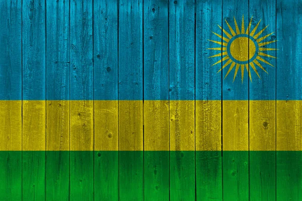 Rwanda flag painted on old wood plank