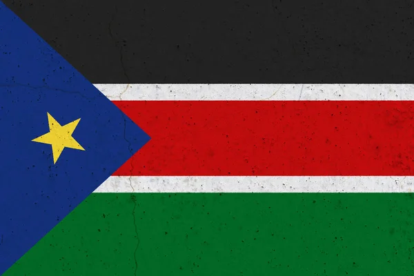 South Sudan flag on concrete wall