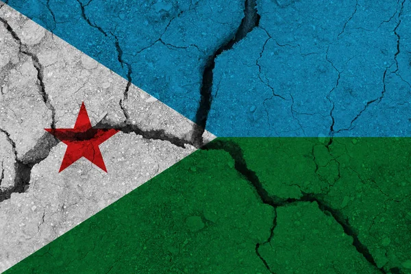 Djibouti flag on the cracked earth