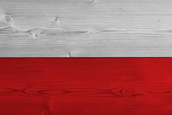 Poland flag painted on old wood plank