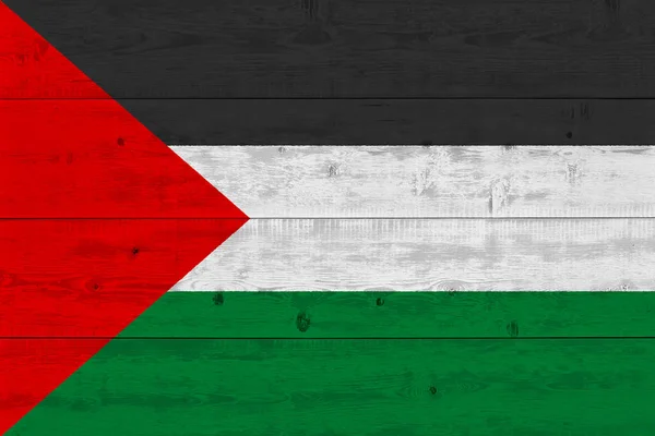 palestine flag painted on old wood plank