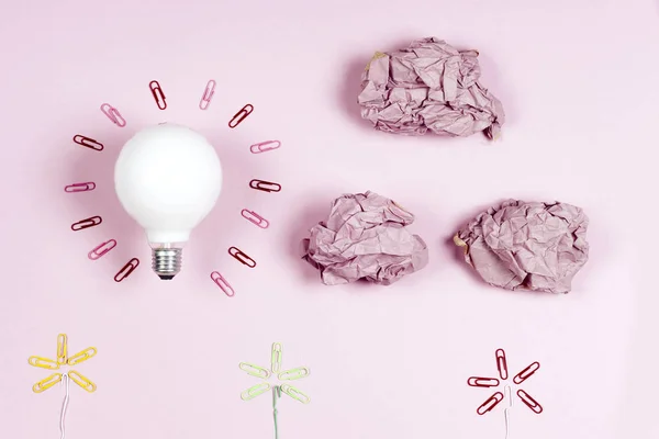 great idea concept with crumpled colorful paper and light bulb o