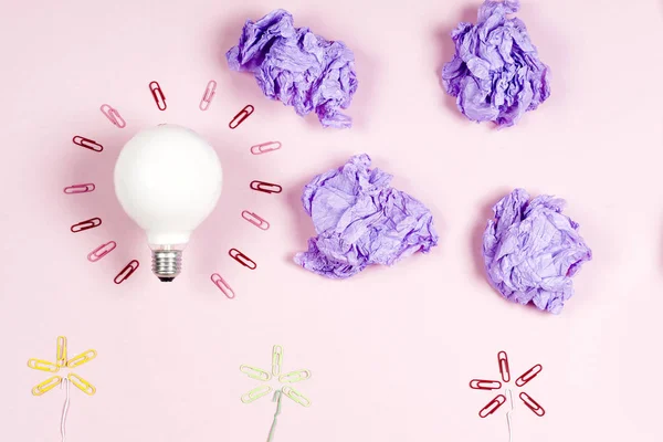 great idea concept with crumpled colorful paper and light bulb o