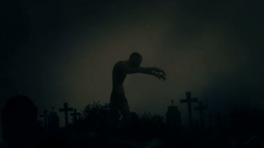 Erkek zombi yürüme bir mezarlık mezarında dışında