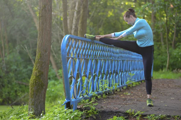 The girl is engaged in a sports park