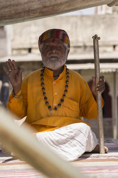 man yogi in the Indian city of Varanasi, the embankment of the river Ganges. November 2016