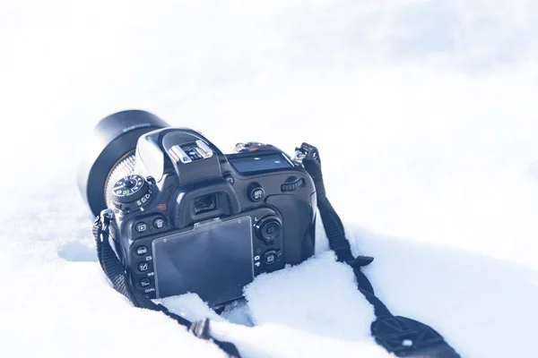 camera in the snow, winter photo session