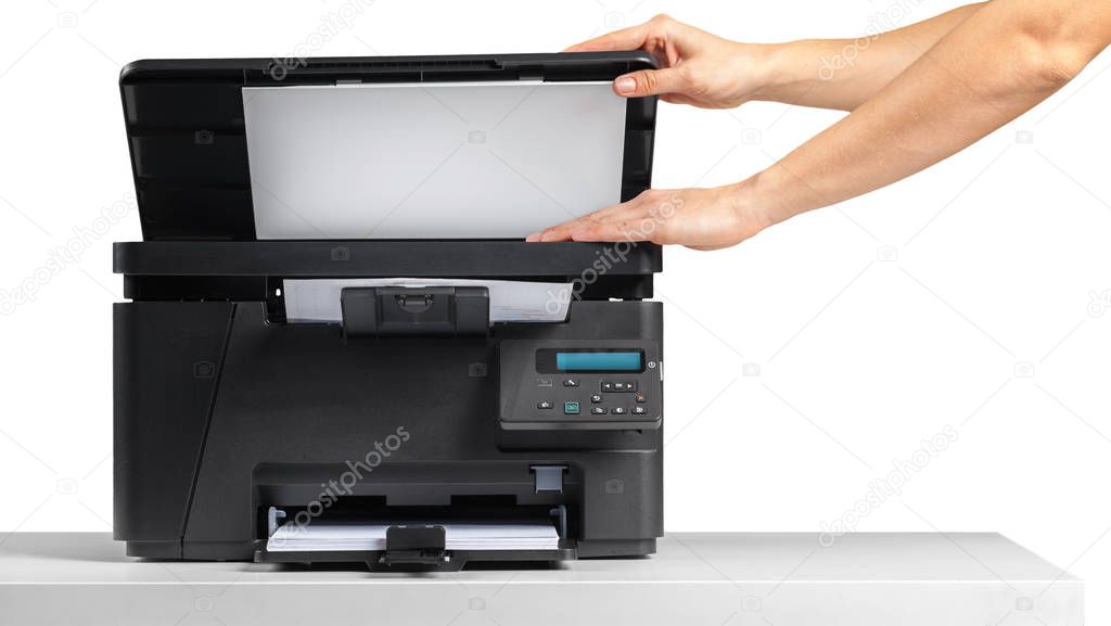 Woman hand using printer in office