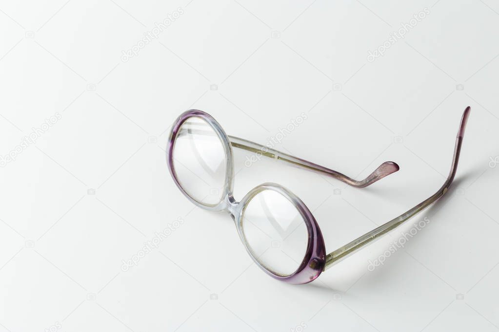 Detail view of eyeglasses isolated on white