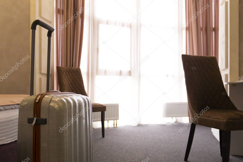 luggage bag in modern hotel room