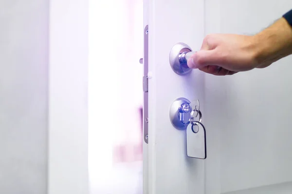 Man Opening Hotel Door Concept — Stock Photo, Image