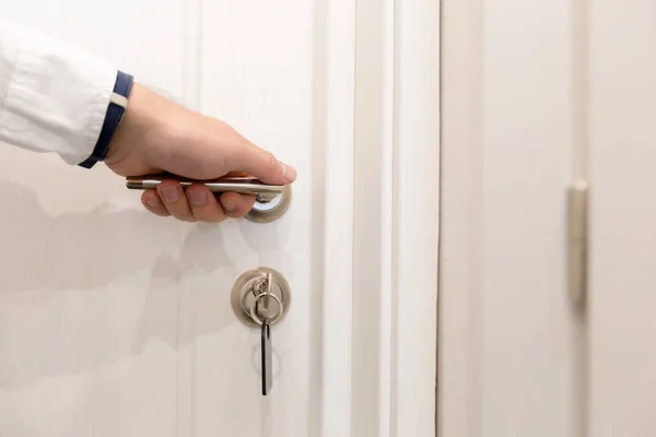 Man Opening Hotel Door Concept — Stock Photo, Image