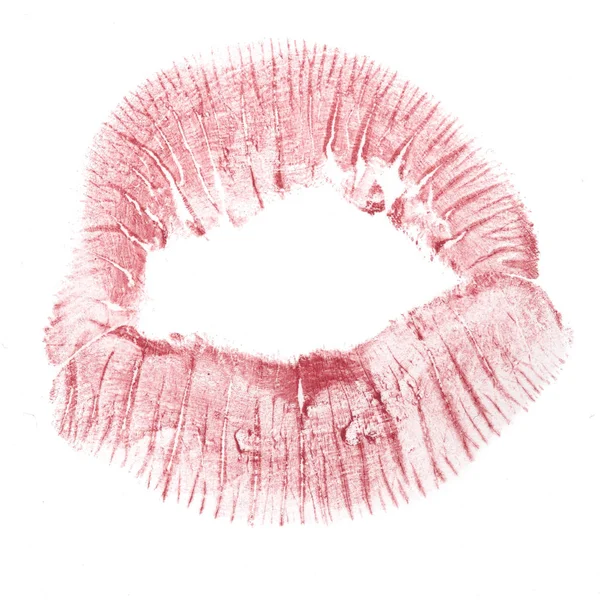 imprint of red kiss isolated on white background, close-up