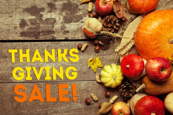 Happy thanksgiving day sale display on wooden background