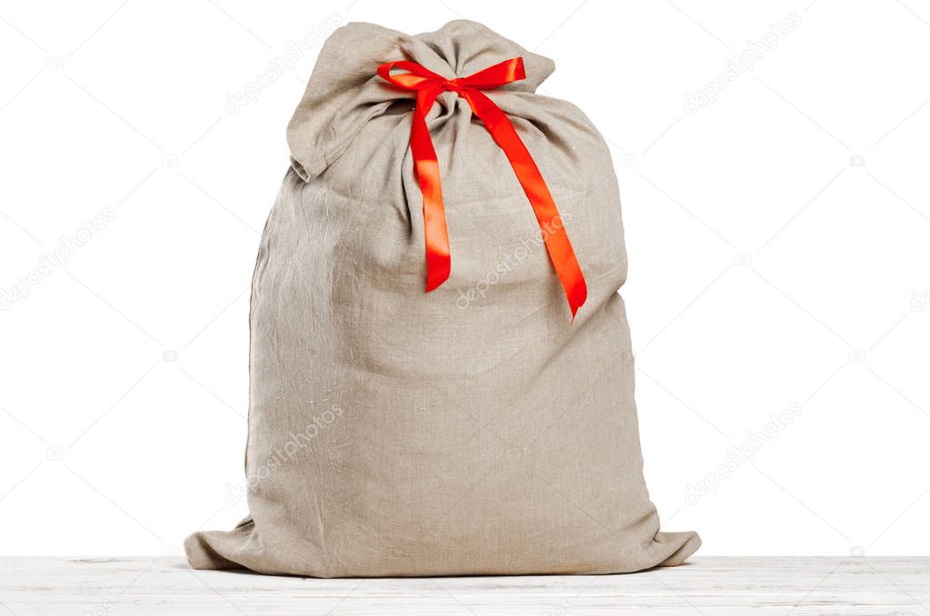 christmas sack full of gifts isolated on white background 