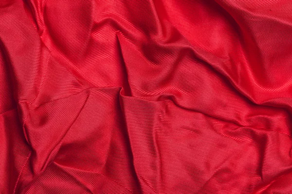 Getextureerde Golvende Rode Doek Als Achtergrond — Stockfoto