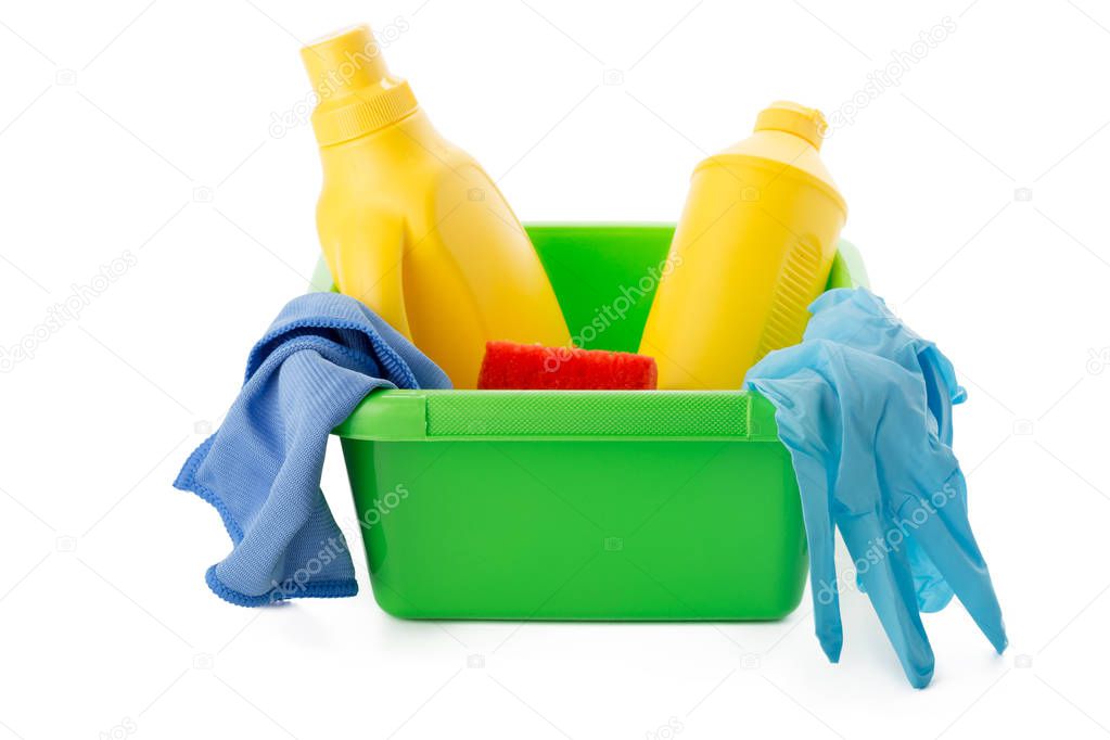 ousehold cleaners and equipment in bucket isolated