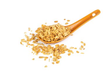 Beyaz arka plan üzerinde izole granola kaşıkla yakın çekim  