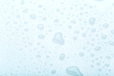 mavi arka plan yüzeyinde su damlaları