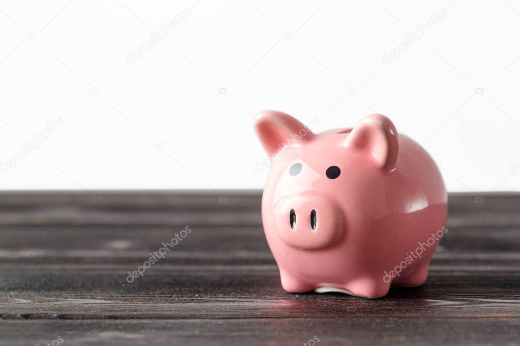 piggy bank on wooden background