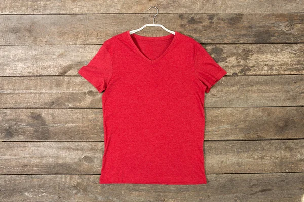 Basic cotton t-shirt on on wooden background