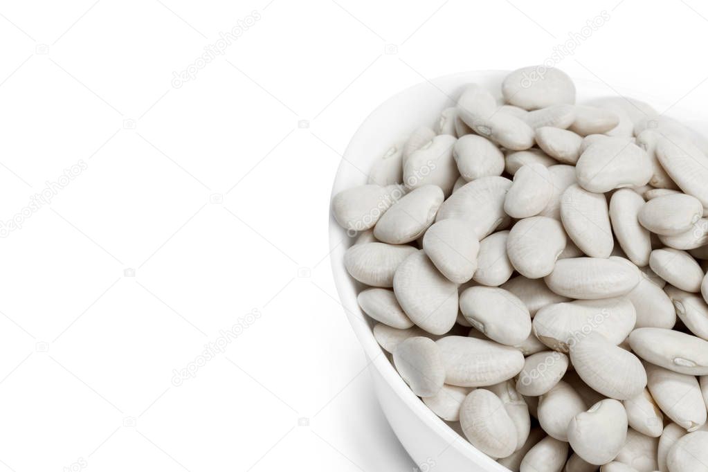Pile of raw white beans isolated on white background