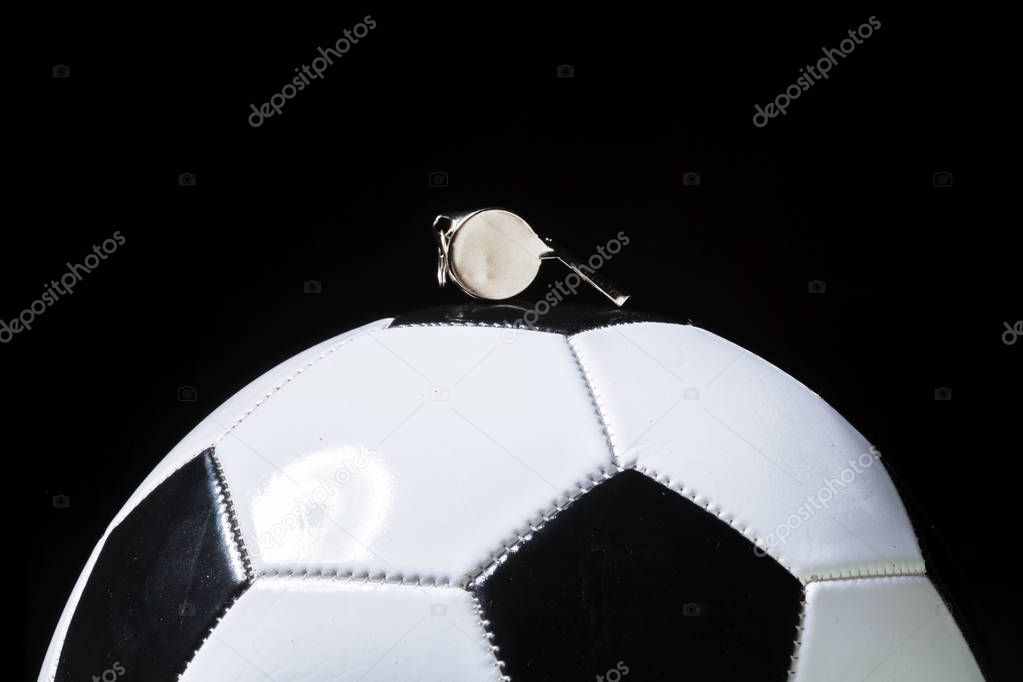 Football ball with whistle