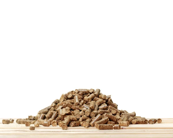 Holzpellets Auf Holztischhintergrund — Stockfoto