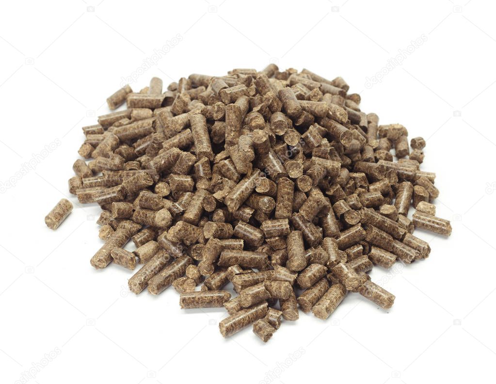 stack of wooden pellets for bio energy isolated on white background