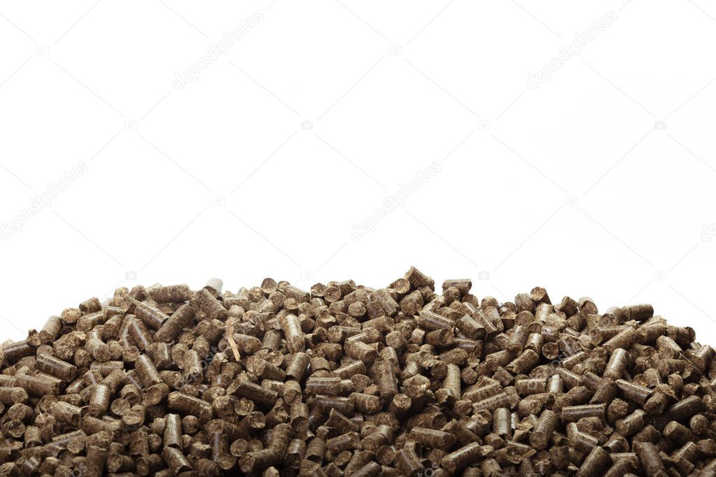 Wooden pellets isolated on white background.