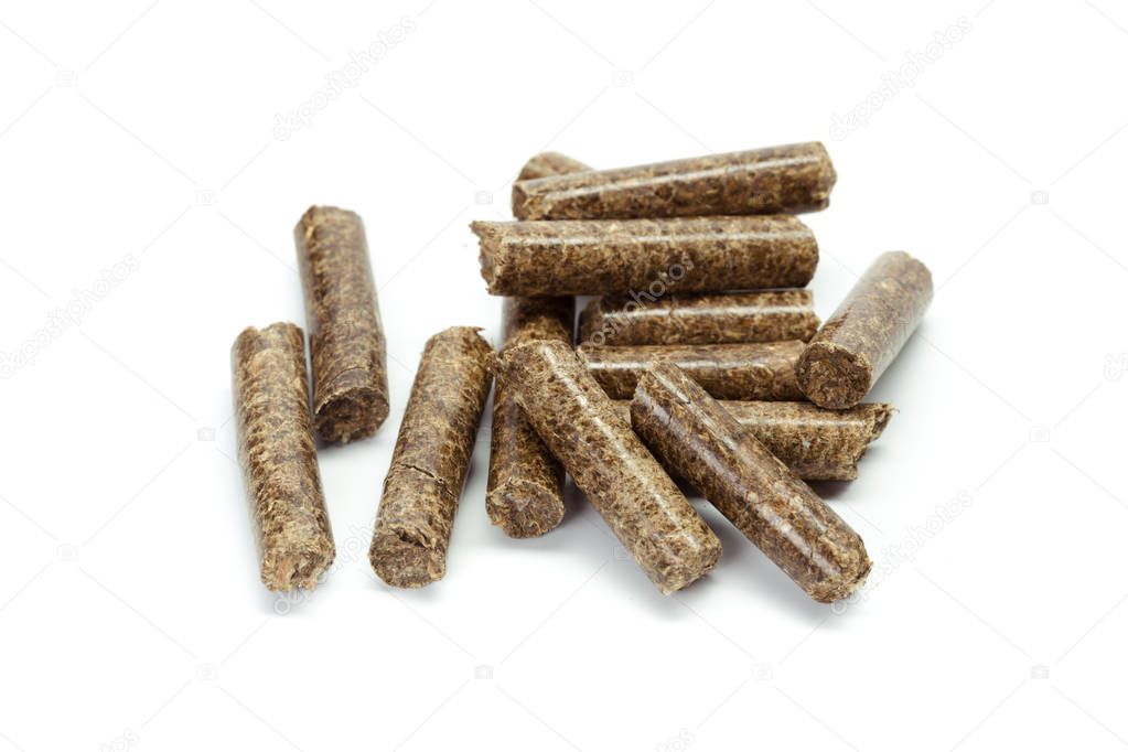 stack of wooden pellets for bio energy isolated on white background