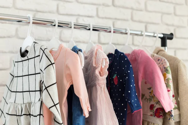 Colorful Children Clothes Hanging Hangers — Stock Photo, Image