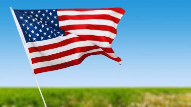 Mavi gökyüzüne karşı Amerikan bayrağı