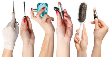 Araçlar üzerinde beyaz izole makyaj için holding eller topluluğu