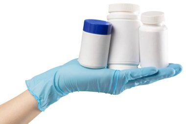 Bir ilaç ile eldivenli elini