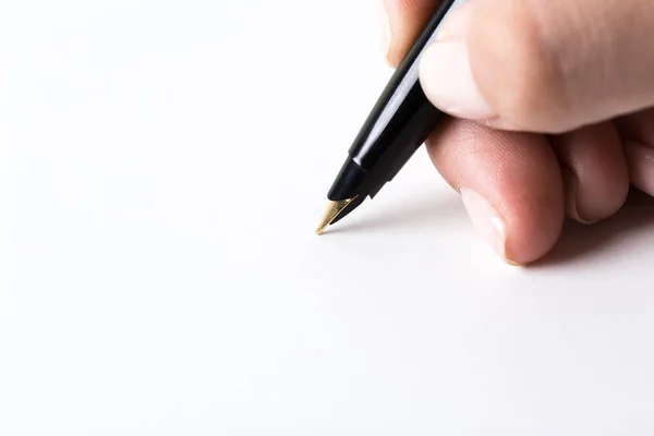 Χέρι Που Κρατά Την Πένα Που Απομονώνονται Λευκό Φόντο Γκρο — Φωτογραφία Αρχείου