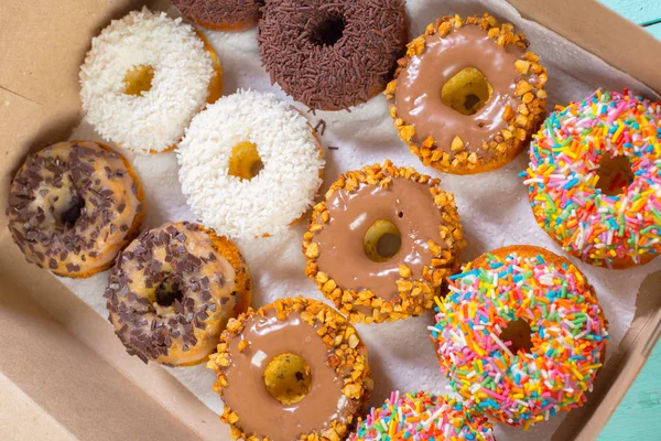Top view of different donuts in box