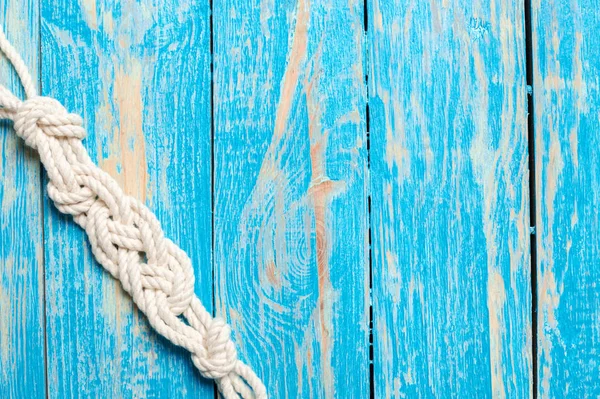 blue nautical background with rope