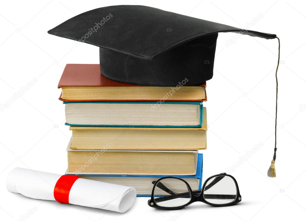 Grad hat and diploma with book isolated on white