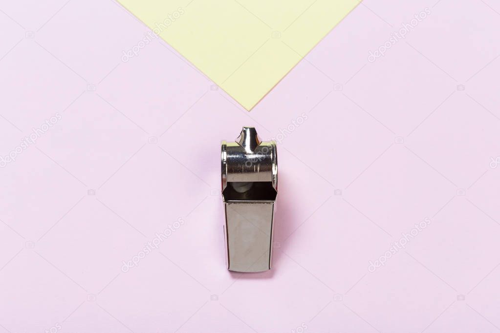 Referee Whistle on color background