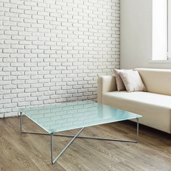modern glass table in the loft interior