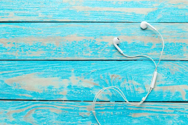 Earphones Wooden Table Top View — Stock Photo, Image