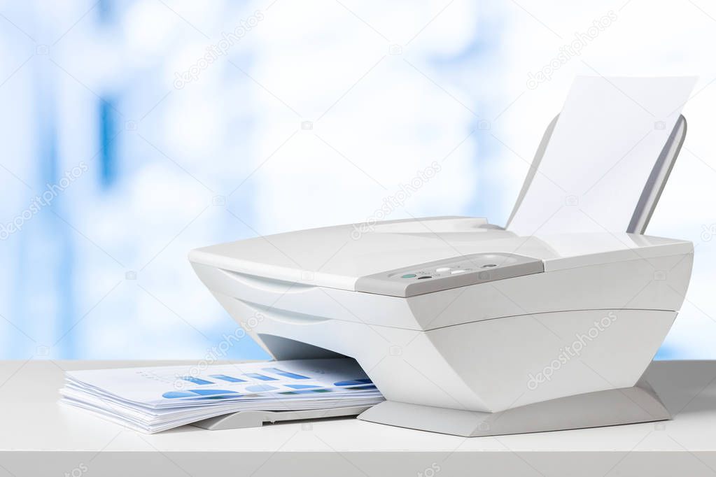 Printer on white desk