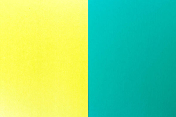 Sheets of blue and yellow colored paper