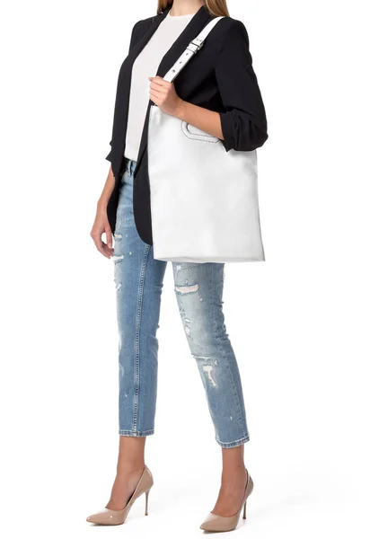 白い背景に分離されたハンドバッグを保持している女性 — ストック写真