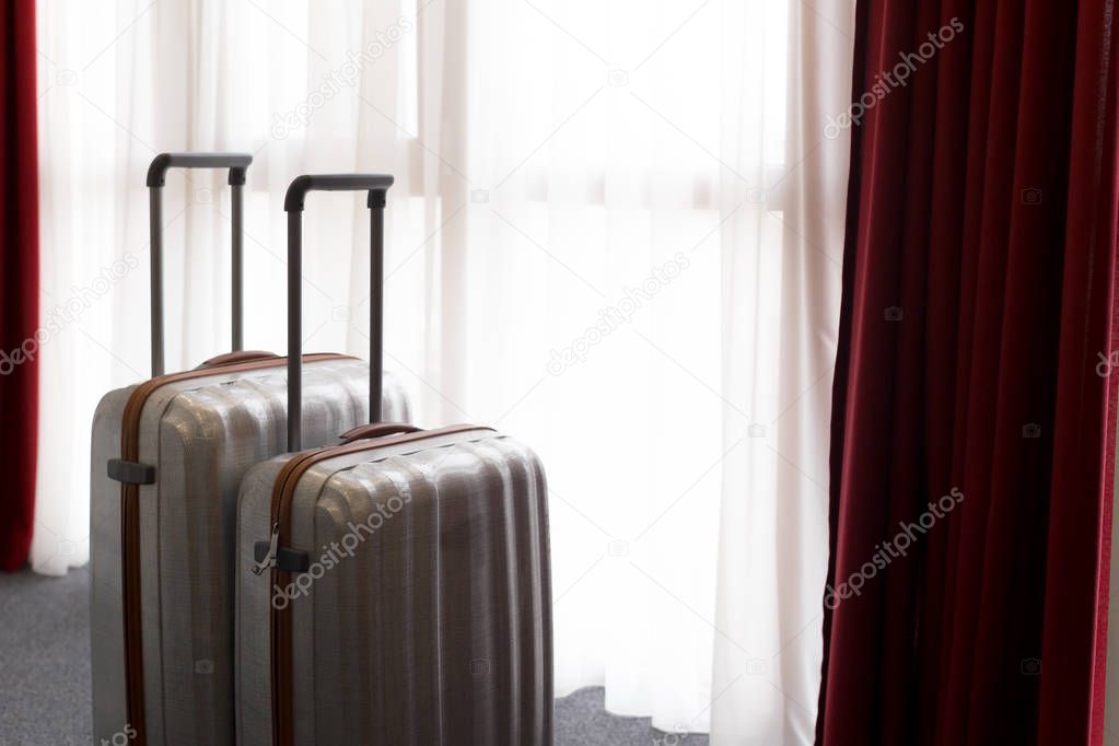 Suitcase or luggage bag in a modern hotel room